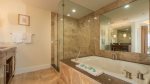 Master ensuite with spa tub, glassed shower, his-n-hers sinks